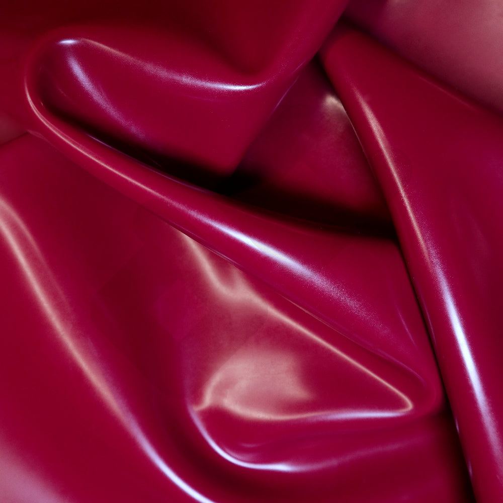 Close-up of a shiny plum colored latex sheet