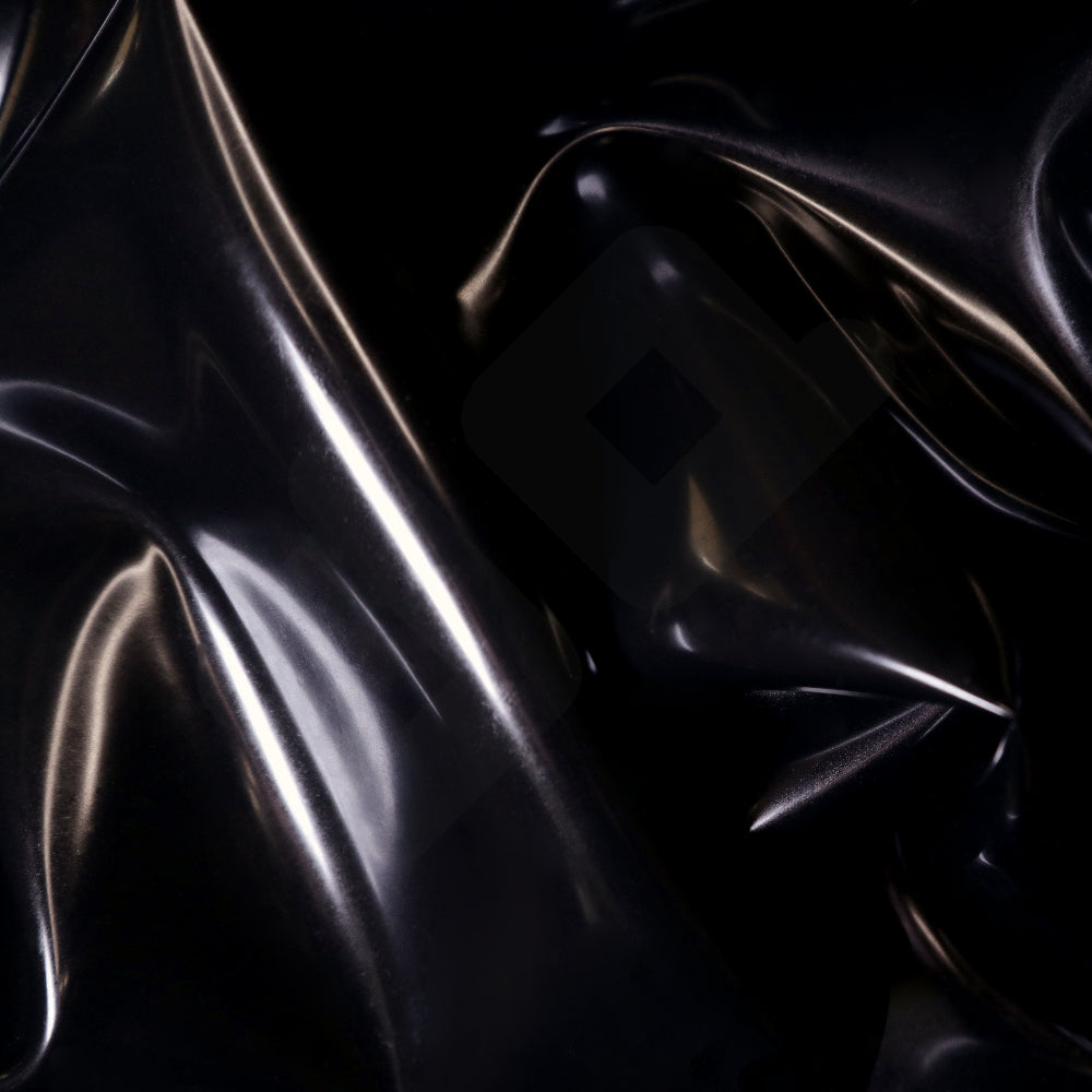 Close-up of a shiny black latex sheet