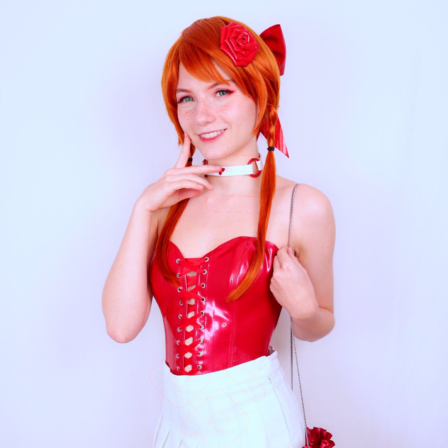 An Anime character named 'Elena de Haes' has red hair styled in braids, decorated with a red rose and bow wearing a red designer latex corset of the Akiko luxury brand and a white skirt, against a light purple background.
